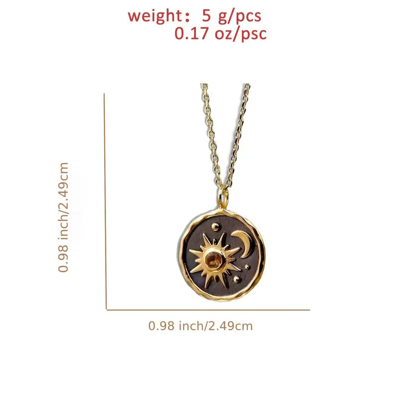Gold Tone Sun and Moon Pendant